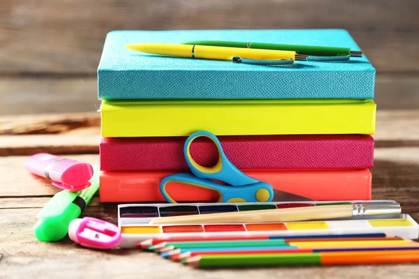Bright school stationery on old wooden table — Stock Photo, Image