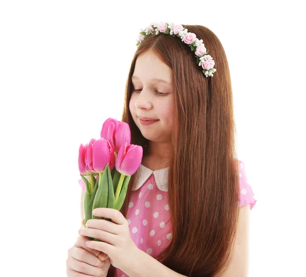 Krásná holčička s květinami, izolovaných na bílém — Stock fotografie