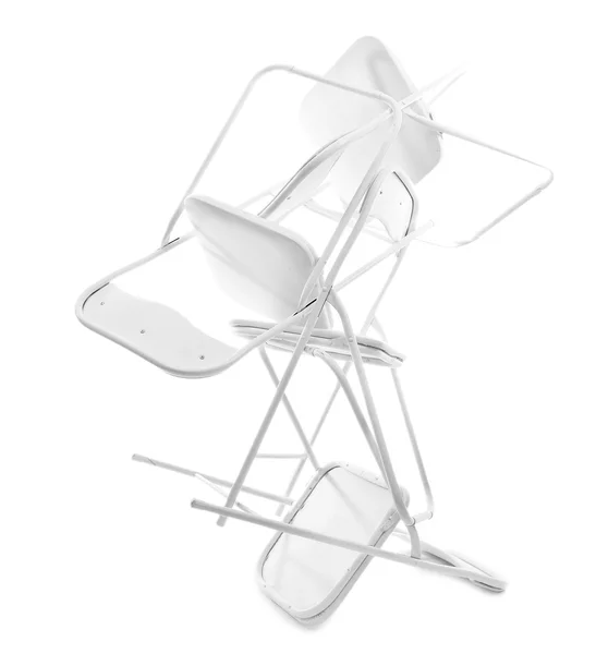 Pilha de cadeiras de metal isoladas em branco — Fotografia de Stock
