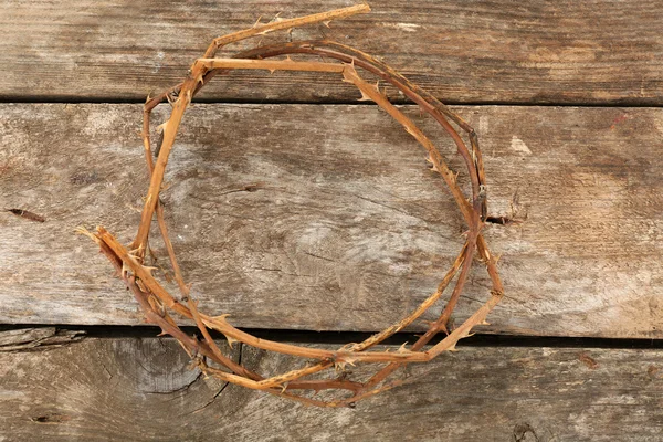 Crown of thorns on old wooden background — Stock Photo, Image