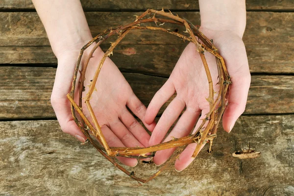 Crown of thorns in hands, close up — Stock Photo, Image