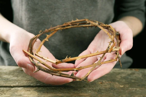 Crown of thorns in hands, close up — Stock Photo, Image