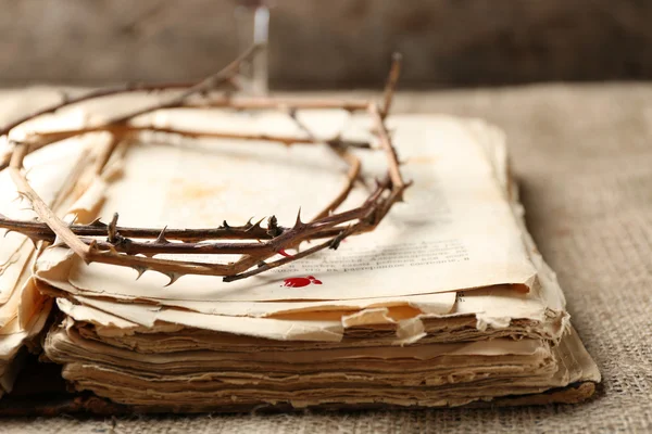 Crown of thorns with blood and bible, close up — Stock Photo, Image