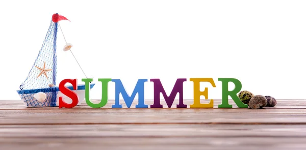 Slovo léto na dřevěné lůžko — Stock fotografie