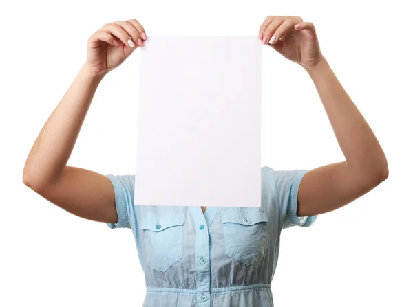 Woman covering her face with blank sheet of paper isolated on white — Stock Photo, Image