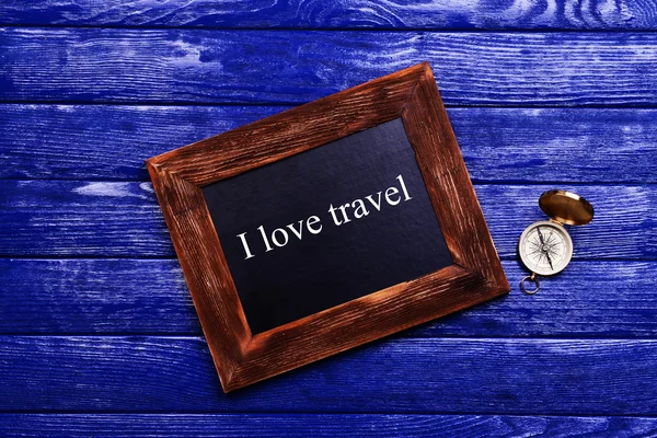 Travel inscription on wooden background — Stock Photo, Image