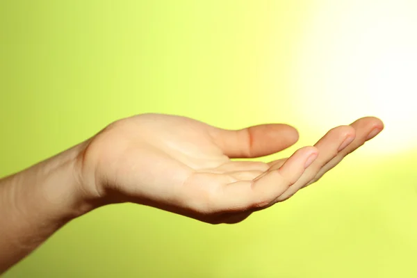 Female hand on colorful background — Stock Photo, Image