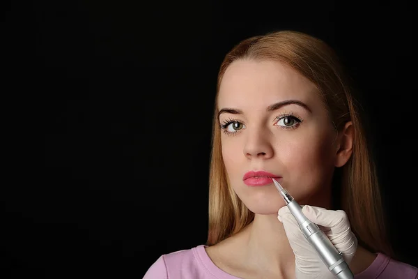 Permanent make-up (tattoo) on dark background — Stock Photo, Image