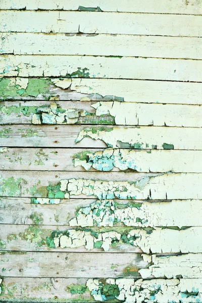 Peeling paint on old wooden wall — Stock Photo, Image