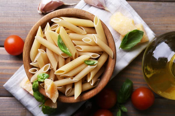 Raw pasta with cheese and vegetables — Stock Photo, Image