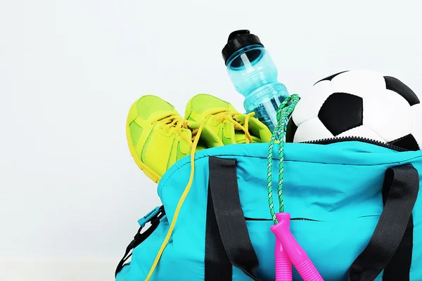 Sports bag with sports equipment — Stock Photo, Image