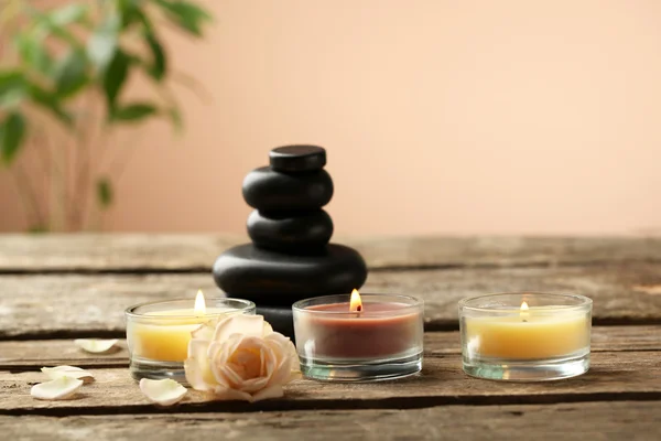 Beautiful spa composition on wooden table, on brown background — Stock Photo, Image