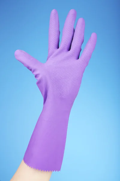 Rubber glove on hand — Stock Photo, Image