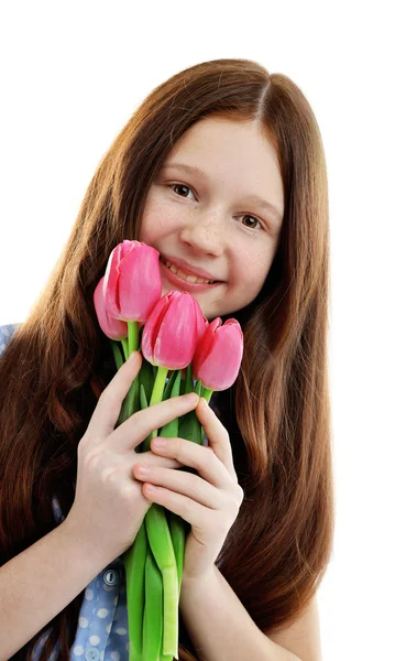 Gyönyörű virágokkal, elszigetelt fehér kislánya — Stock Fotó