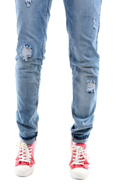 Menselijke benen in spijkerbroek — Stockfoto