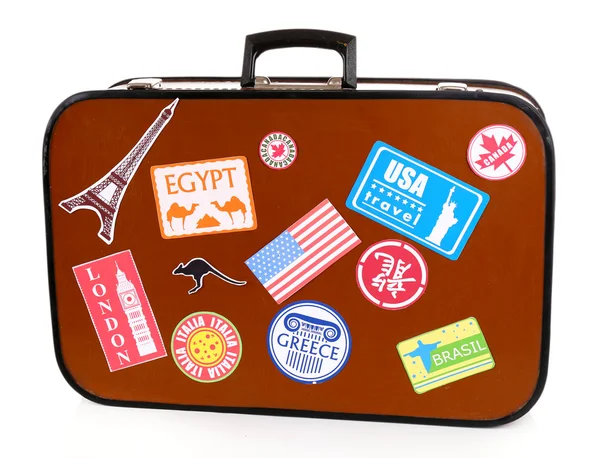 Travel suitcase with stickers Stock Photo by ©belchonock 69255415
