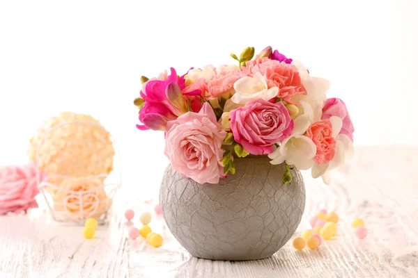 Beautiful fresh spring flowers in pot — Stock Photo, Image