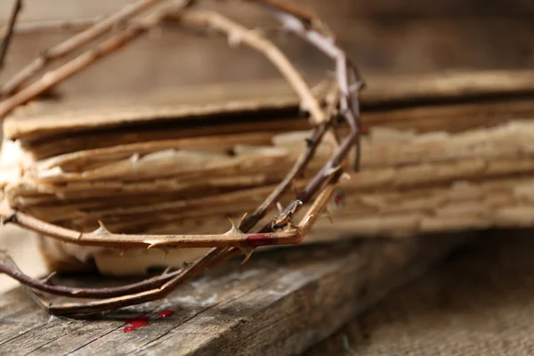 Crown of thorns with blood and bible, close up — Stock Photo, Image
