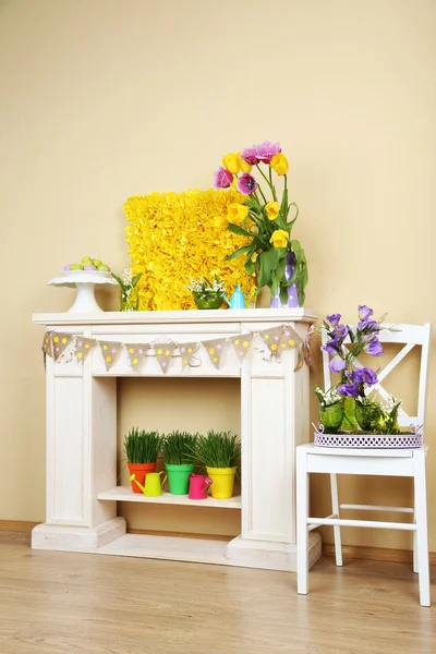 Fireplace with beautiful spring decorations — Stock Photo, Image