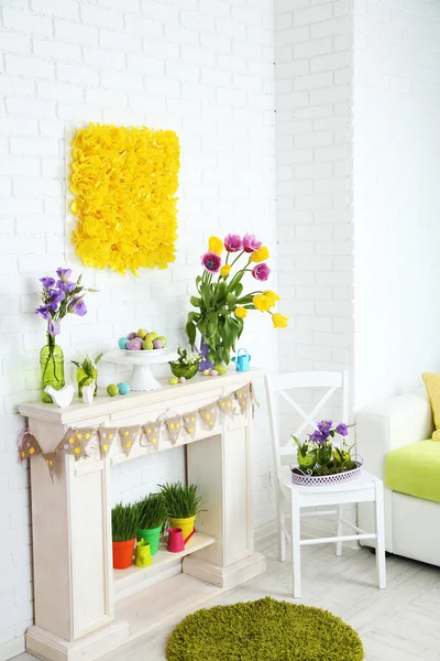 Fireplace with beautiful spring decorations — Stock Photo, Image