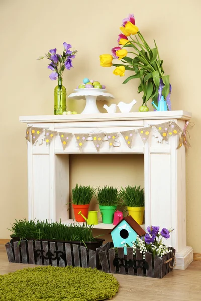 Fireplace with beautiful spring decorations — Stock Photo, Image