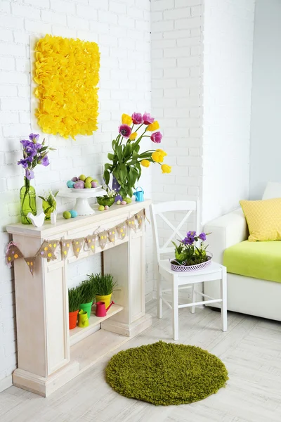Fireplace with beautiful spring decorations — Stock Photo, Image