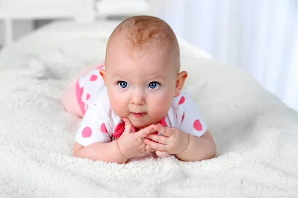 Cute baby girl, on home interior background — Stock Photo, Image