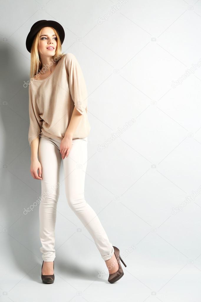 Expressive young model on gray background