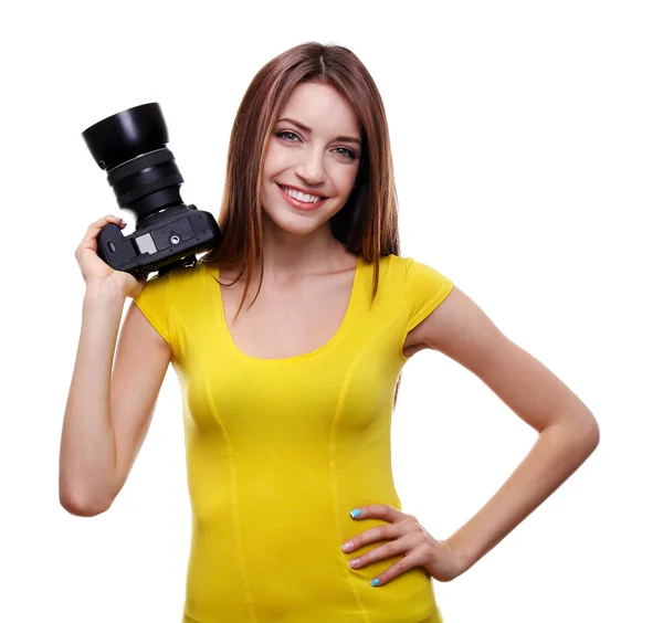 Young female photographer taking photos isolated on white — Stock Photo, Image