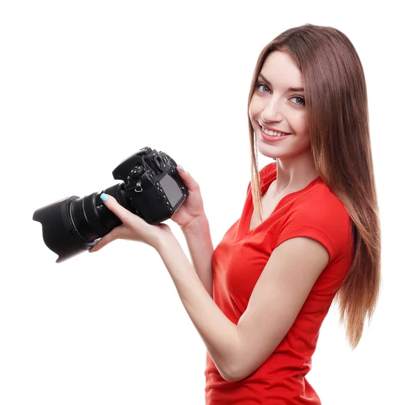 Młoda kobieta fotograf robienia zdjęć na białym tle — Zdjęcie stockowe
