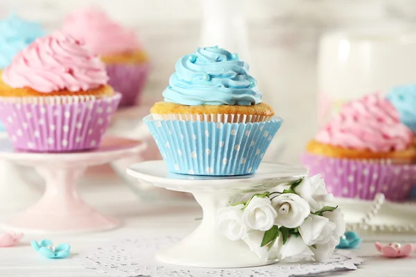 Delicious cupcakes on table — Stock Photo, Image