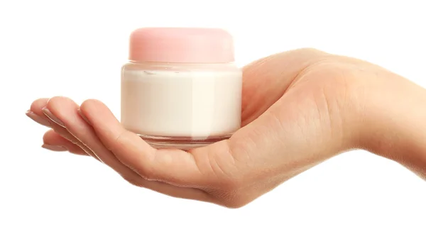 Mão feminina segurando frasco de creme isolado em branco — Fotografia de Stock