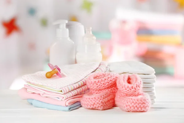 Baby accessories on table on light background — Stock Photo, Image