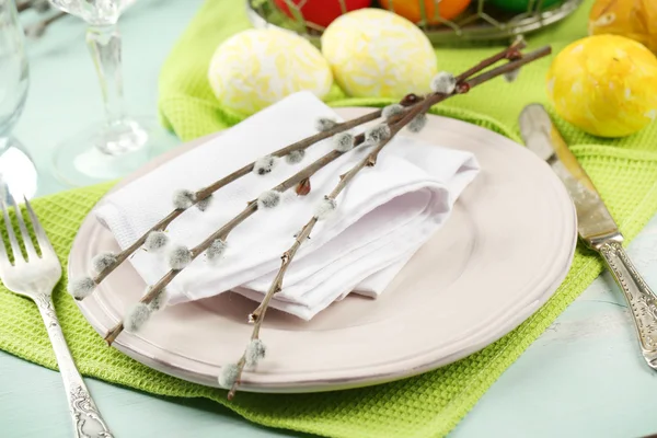 Easter table setting on color wooden background — Stock Photo, Image