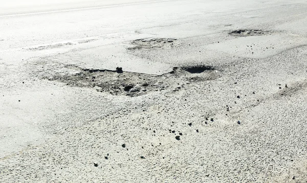 Very bad quality road with potholes — Stock Photo, Image