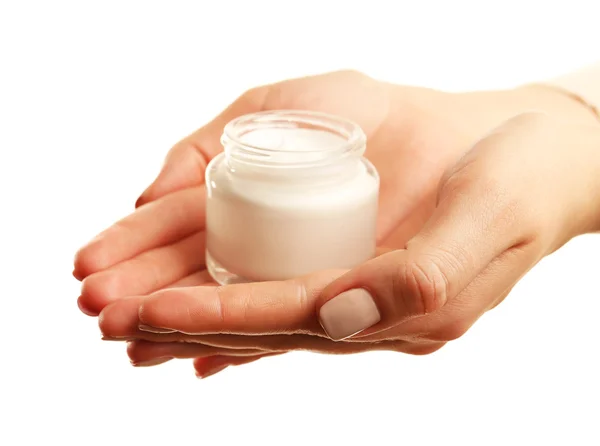 Mano femenina con crema aislada sobre blanco — Foto de Stock