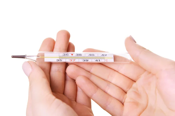 Female hands holding thermometer isolated on white — Stock Photo, Image