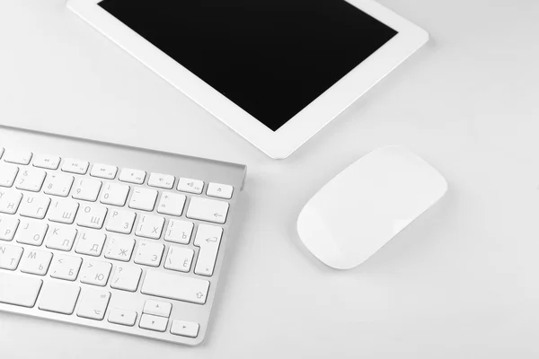 Office workplace with tablet and computer close up — Stock Photo, Image