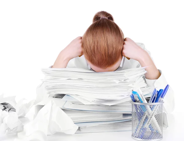 Mulher cansada em seu local de trabalho com documentos isolados em branco — Fotografia de Stock