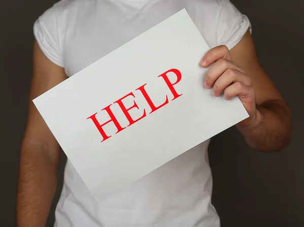 Sheet of paper with Help sign — Stock Photo, Image