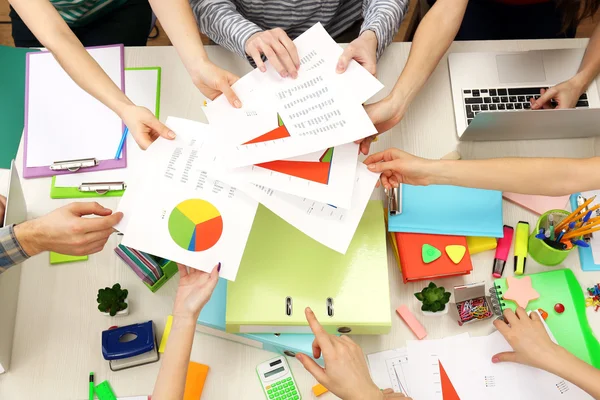 Group of people working at desk — Stock Photo, Image