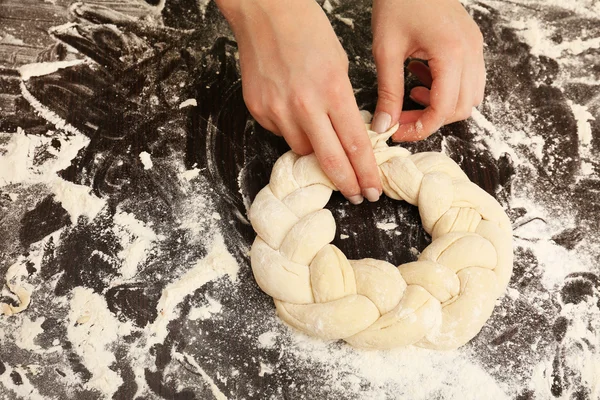 Making pie by female hands on wooden table background — Stock Photo, Image