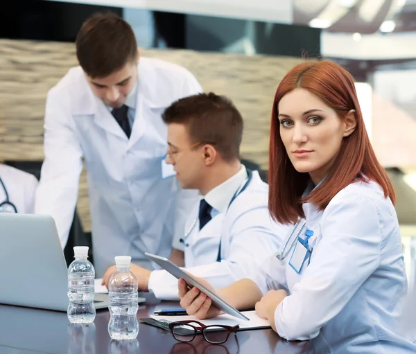Medical workers working in conference room — Stock Photo, Image
