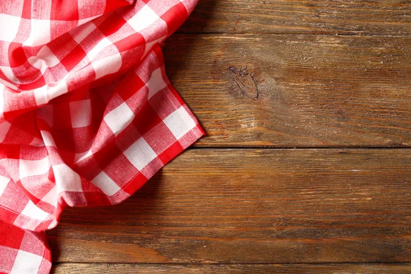 Napkin on wooden background — Stock Photo, Image