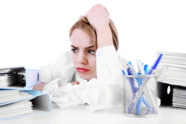 Tired woman at her workplace with documents isolated on white — Stock Photo, Image