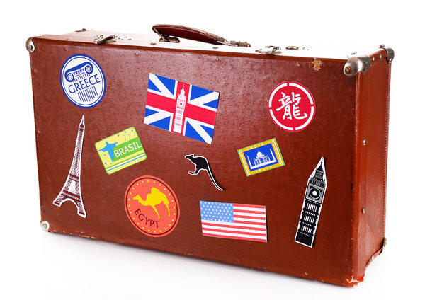 Suitcase with stickers isolated on white