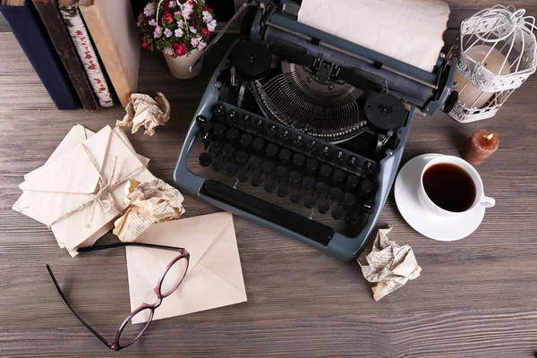 Retro typewriter on wooden table, top view — Stock Photo, Image