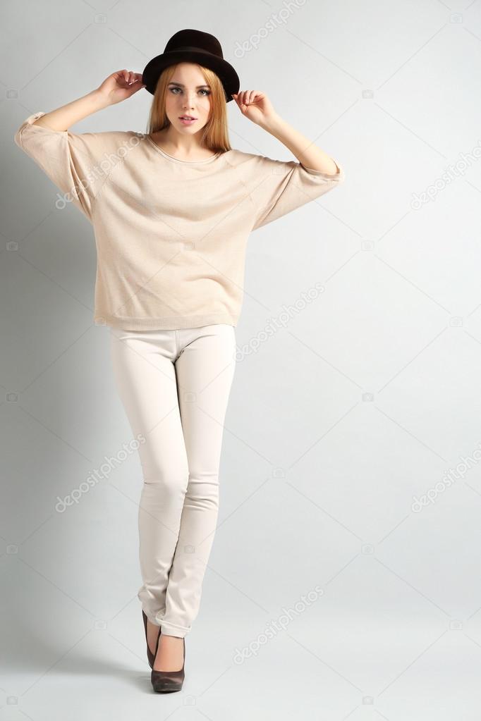 Expressive young model on gray background