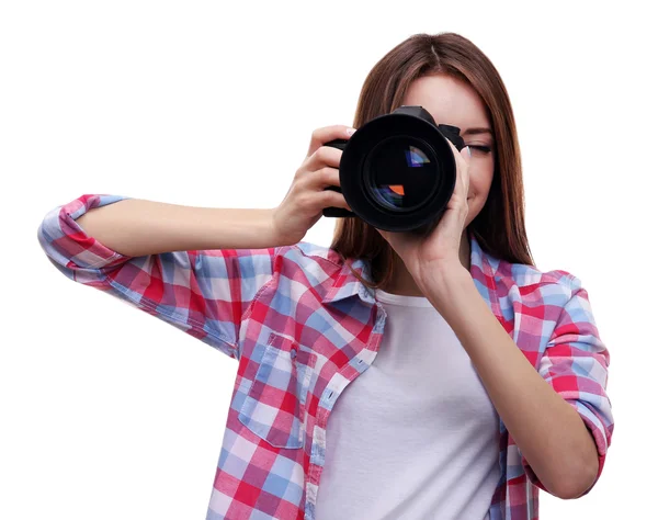 Jonge vrouwelijke fotograaf fotograferen geïsoleerd op wit — Stockfoto