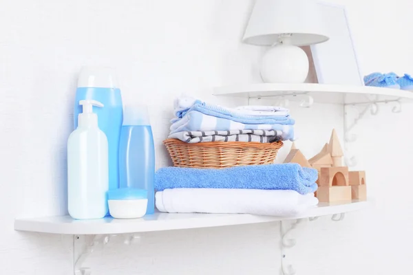 Baby accessories on shelves close-up — Stock Photo, Image